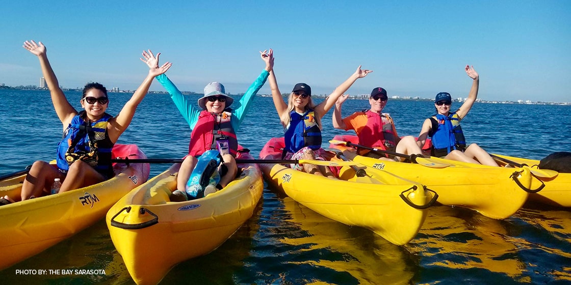 group of kayakers at mangrove bayou walkway