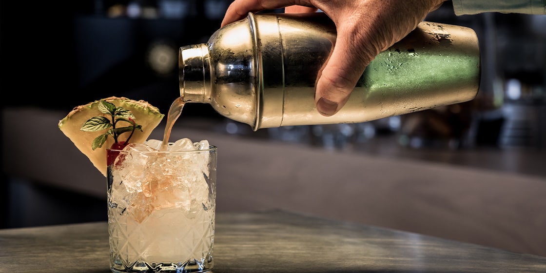 cocktail being poured in a downtown sarasota bar